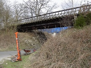 Rückbau einer Dauerbehelfsbrücke und Ersatz durch Erstellung eines Bahndamms  